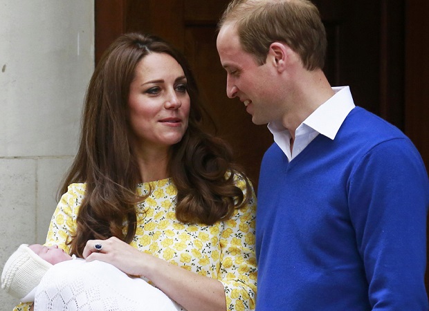 Britain's Prince William and his wife Catherine, Duchess of Cambridge appear with their baby daughter outside the Lindo Wing of St Mary's Hospital in London